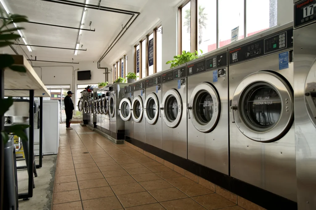 The machine aisle at The Laundry Hub SF on Mission Street in San Francisco